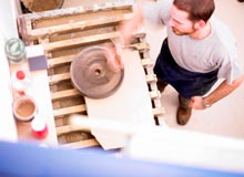 A stone being grained.